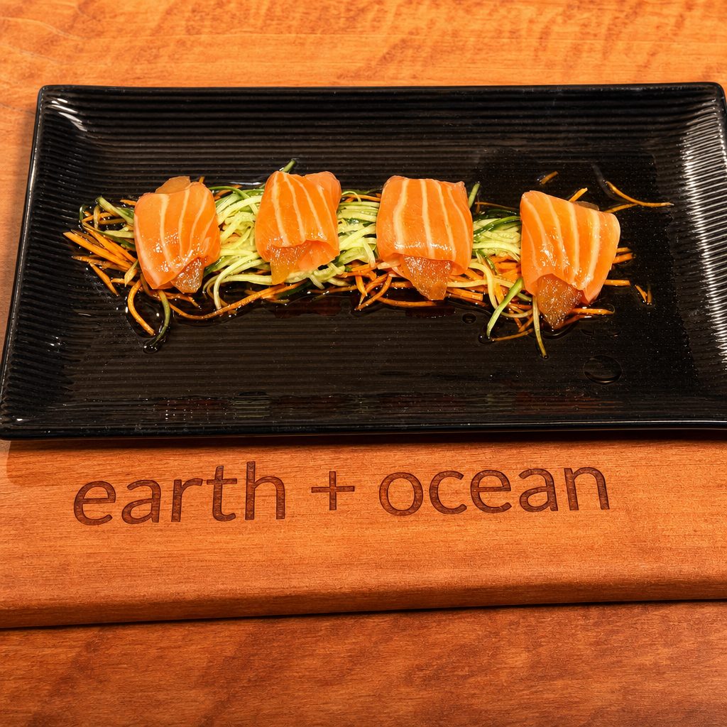Poached Pear wrapped in thin, sliced salmon.