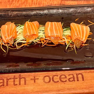 Poached Pear wrapped in thin, sliced salmon